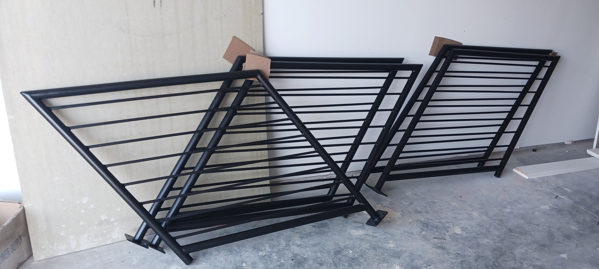 5 guard rails after their guys did the final paint but before installation.
